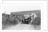 A Morris Bullnose driving through a gateway, early 1920s by Unknown