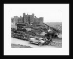 A Singer car in front of Harlech Castle, Wales, early 1920s by Unknown