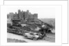 A Singer car in front of Harlech Castle, Wales, early 1920s by Unknown