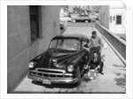 Men with a 1949 customised Chevrolet, (c1949?) by Unknown