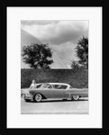 Woman with a 1957 Cadillac coupe de ville by Anonymous