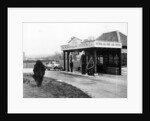 1923 10 hp Calcott arriving at a petrol station by Anonymous