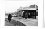 1923 10 hp Calcott arriving at a petrol station by Anonymous