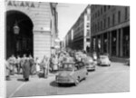 Fiat 600 Multipla leading a procession of Fiats, Italy, (late 1950s?) by Unknown