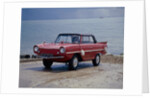 A 1965 Amphicar at the water's edge by Unknown