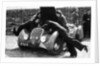 Miss MD Patten looking at the engine of a 1938 Peugeot 402 Special Sport, RAC Rally, 1939 by Unknown