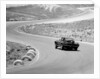 1964 Chevrolet Corvette Stingray on a winding racetrack, (c1964?) by Unknown
