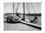 A Citroën 2CV on the quay at a harbour, c1957 by Unknown