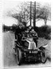 A man and boys in a De Dion car, 1908 by Unknown