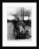 A man and boys in a De Dion car, 1908 by Unknown