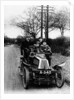 A man and boys in a De Dion car, 1908 by Unknown