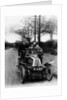 A man and boys in a De Dion car, 1908 by Unknown