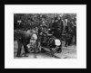 Karl Burlage having his Norton bike weighed for a TT competition by Unknown