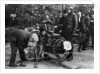 Karl Burlage having his Norton bike weighed for a TT competition by Unknown
