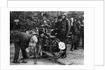 Karl Burlage having his Norton bike weighed for a TT competition by Unknown