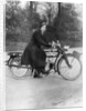 A woman on a Douglas motorbike by Anonymous