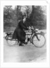 A woman on a Douglas motorbike by Anonymous