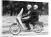 A man and a woman riding an Ariel Leader, 1958 by Unknown