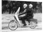 A man and a woman riding an Ariel Leader, 1958 by Unknown