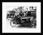 Woman riding a 1929 500cc AJS motorbike, (c1929?) by Unknown