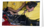 Mechanic at work in the Ferrari pits, 1988 by Unknown