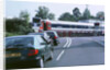 Traffic queue at level crossing in Brockenhurst, Hampshire by Unknown