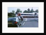 Traffic queue at level crossing in Brockenhurst, Hampshire by Unknown