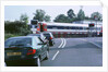 Traffic queue at level crossing in Brockenhurst, Hampshire by Unknown
