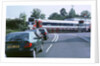 Traffic queue at level crossing in Brockenhurst, Hampshire by Unknown