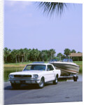 1967 Ford Mustang towing a boat by Unknown