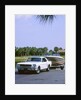 1967 Ford Mustang towing a boat by Unknown