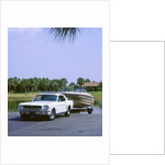 1967 Ford Mustang towing a boat by Unknown