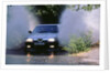 1989 Alfa Romeo 164 driving through a ford by Unknown
