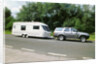 1995 Toyota Landcruiser towing large caravan at speed by Unknown