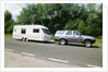 1995 Toyota Landcruiser towing large caravan at speed by Unknown