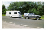 1995 Toyota Landcruiser towing large caravan at speed by Unknown