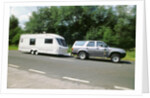 1995 Toyota Landcruiser towing large caravan at speed by Unknown