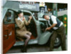 Mechanic with lady driver doing her make up, 1930's Hillman Minx by Unknown