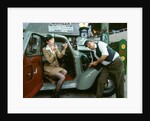 Mechanic with lady driver doing her make up, 1930's Hillman Minx by Unknown