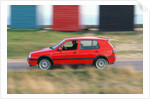Man driving 1996 Vokswagen Golf Gti by Unknown