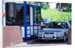 Subaru using toll booth on Itchen bridge, Southampton by Unknown