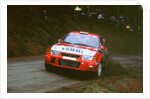 1999 Mitsubishi Lancer EVO, Network Q Rally.Timo Makinen by Unknown