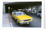 Yellow taxi cab at airport by Unknown
