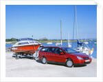 2002 Citroen C5 hdi towing a boat by harbour by Unknown