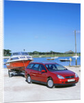 2002 Citroen C5 hdi towing a boat by harbour by Unknown