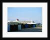 Queen Mary II sails past Beach Huts, Calshot May 2004 by Unknown