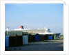 Queen Mary II sails past Beach Huts, Calshot May 2004 by Unknown