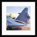 Donald Campbell examines Bluebird, Lake Eyre, Australia, 1960s by Unknown