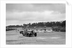 J Cleland's Ford V8 and JH Barker's Riley Lynx at the chicane, JCC Members Day, Brooklands, 1939 by Bill Brunell