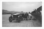 GL Baker's 5954 cc Minerva undergoing a rear wheel change at Brooklands by Bill Brunell
